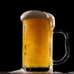 100+ Best Quality Beer Bottle Images 11 A Beer Glass with Foams