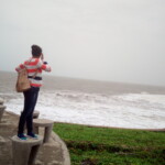 A woman Looking at the sea