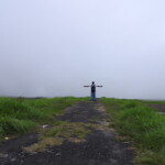 a man at the end of a hill