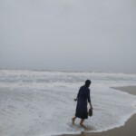 a woman enjoying on a beach