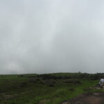 clouds meeting the hills