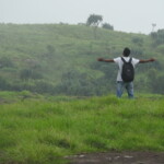 man with open hands in the forests