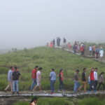 people at a beautiful natural spot