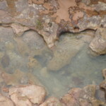river eating away the stones