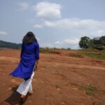 woman walking in a field