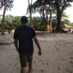 A man walking in bushes