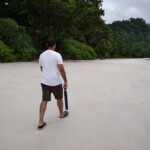 A man walking on a beach