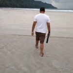 A man walking on a beach