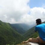 A man watching the mountains