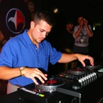 a boy playing dj
