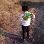 a child enjoying on a highland