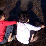 children enjoying pristine waters