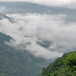 clouds across the hills