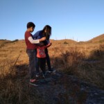 people - a group of children on a cliff