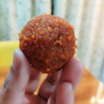 motichoor laddoo in hand